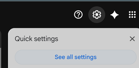 Gmail inbox with the gear icon highlighted